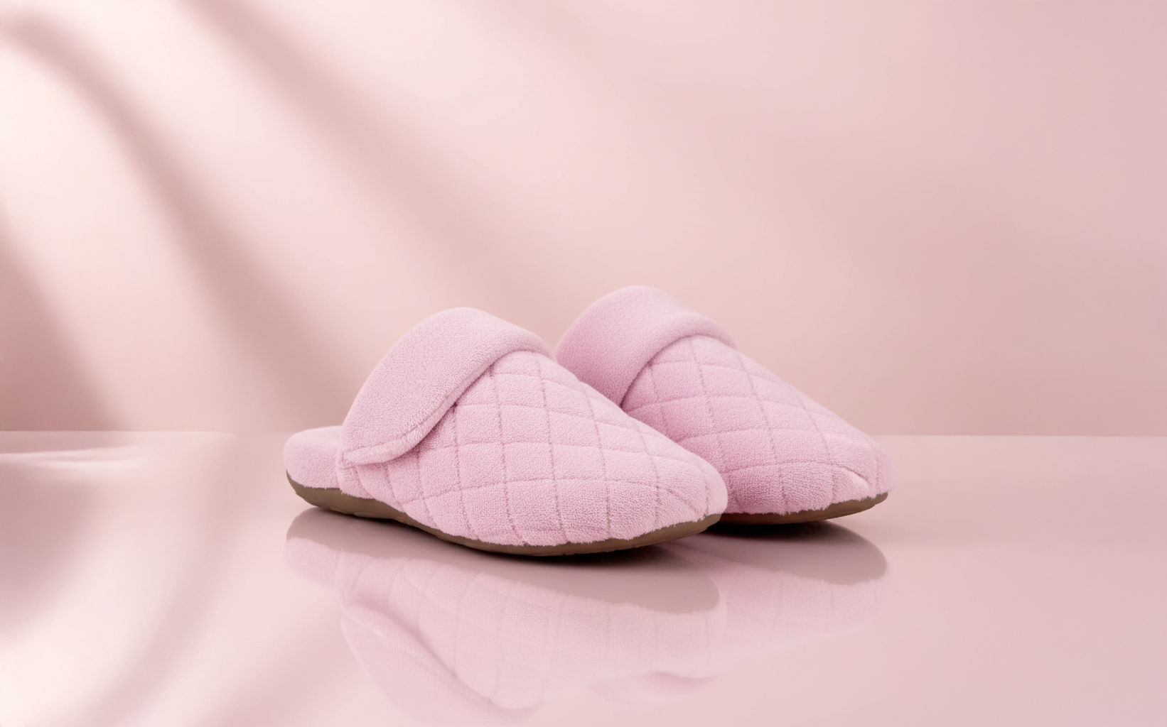 Infographic showing the four essential features of supportive indoor/outdoor slippers: built-in arch support architecture with contoured design, shock-absorbing multi-layer cushioning systems, durable slip-resistant sole construction with tread patterns, and adjustable fit with proper toe box design. Each section includes specific measurements, materials, and health benefits for foot support and pain relief.
Signature Built-in Arch Support
This is the most important feature to look for. True support starts with the arch. A slipper with signature built-in arch support helps to properly align your feet, which can have a positive ripple effect on your knees, hips, and back. This isn't just a small bump in the insole; it's a thoughtfully designed contour that cradles your arch to help distribute pressure evenly across your foot. This feature is crucial for preventing strain and providing relief from common issues. When your arch is supported, your foot is in a more stable position, which helps to reduce fatigue and discomfort throughout the day. Aetrex designs all its women's footwear with this principle at its core.
Superior Cushioning for Shock Absorption
Walking on hard surfaces like wood or tile all day can be tough on your joints. That’s where superior cushioning comes in. A well-cushioned slipper acts as a shock absorber, softening the impact of each step and reducing the stress transmitted to your feet, ankles, and knees. Look for slippers with memory foam or other premium cushioning materials that mold to your foot's unique shape while providing a plush, protective layer. This feature is especially beneficial if you experience foot pain, as it can significantly improve your comfort and function around the house. The right cushioning helps to make every step feel lighter and more comfortable, which is why it's a key component in shoes designed for plantar fasciitis relief.
A Durable, Slip-Resistant Sole
Safety and versatility are key, even at home. A durable, slip-resistant outsole is a must-have feature for any supportive slipper. It provides the traction you need to walk confidently on smooth surfaces like hardwood or tile, reducing the risk of slips and falls. This is especially important for indoor/outdoor slippers, as a sturdy sole protects your feet from rougher surfaces when you step outside to grab the paper or water your plants. A well-made sole also ensures your slippers will last, giving you long-term comfort and support without wearing down quickly. It’s the foundation that makes a slipper both practical and reliable for daily wear.
Soft, Breathable Materials
The best supportive slippers feel as good as they function. Soft, high-quality materials prevent irritation and create a cozy environment for your feet. But comfort is about more than just plushness—it’s also about breathability. Materials that allow air to circulate help to keep your feet dry and at a comfortable temperature, preventing the sweaty, stuffy feeling that can come from less advanced fabrics. Look for slippers with soft linings and uppers made from breathable textiles. This combination ensures your feet stay fresh and comfortable, whether you’re wearing them for a few minutes or all day long.
An Adjustable Fit and Roomy Toe Box
A slipper that fits perfectly provides the best support. Features like adjustable hook-and-loop straps allow you to customize the fit to your exact foot shape, which is especially helpful if your feet tend to swell. A secure fit prevents your foot from sliding around inside the slipper, ensuring the arch support is positioned correctly. Equally important is a roomy toe box. Your toes need space to move and spread out naturally, which helps with balance and prevents cramping. A slipper that’s too narrow can cause discomfort and other foot problems. Finding a pair that combines adjustability with ample toe room is key to achieving lasting comfort.
Our Top Picks: The Best Women's Slippers with Arch Support
When you’re looking for the perfect pair of supportive slippers, the options can feel endless. How do you know which ones will actually deliver on their promise of comfort and relief? I’ve done the research for you, focusing on brands that prioritize foot health without sacrificing style. These top picks are designed with features like built-in arch support, deep heel cups, and durable soles to give your feet the foundation they need. Whether you're dealing with a specific foot condition or just want to give your feet a well-deserved break, this list will guide you to the perfect pair for all-day comfort, both inside and out.
Aetrex: The Ultimate in Comfort and Support
When it comes to the best of the best, Aetrex stands in a class of its own. What makes these slippers exceptional is the Aetrex Signature Arch Support built into every pair. This isn't just a bit of foam; it's a thoughtfully designed system that helps stabilize your body and align your feet correctly. Aetrex helps to relieve pressure on your heels and forefoot, which is a game-changer for anyone with plantar fasciitis or ball-of-foot pain. With features like a stabilizing heel cup and adjustable straps for a perfect fit, Aetrex women's footwear provides a level of support that truly makes a difference in how you feel from the ground up.
How to Find Your Perfect Fit
Finding the right pair of supportive slippers goes beyond just picking your usual shoe size. For the arch support and cushioning to truly work their magic, the slipper has to fit your unique foot shape perfectly. A great fit ensures that every supportive feature aligns with your foot's anatomy, providing maximum comfort and relief. Think of it as a custom hug for your feet. When your slippers fit correctly, you get the stability, alignment, and pain relief you need to move through your day with ease. Let’s walk through three simple steps to make sure you find the ideal fit for your new favorite slippers.
Measure Your Feet at Home
Before you even think about adding a pair of slippers to your cart, it’s a great idea to measure your feet. Foot size can change over time due to factors like age, pregnancy, and activity levels, so relying on the size you wore last year might not give you the best fit. To ensure you select slippers that accommodate your foot structure, you can easily measure your feet at home. Simply trace your foot on a piece of paper and measure the length and width. For the most accurate measurement, do this in the afternoon, as your feet tend to swell slightly throughout the day. For an even more precise understanding of your foot, Aetrex’s advanced foot scanners can give you a detailed analysis of your arch type and pressure points.
Choose the Right Width
Width is just as important as length when it comes to a comfortable and supportive fit. A slipper that’s too narrow can cramp your toes and put pressure on bunions, while a slipper that’s too wide won’t hold your foot securely, leading to instability. When you’re looking at slippers, consider the width of your feet and look for designs with a roomy, rounded toe box that allows your toes to spread out naturally. Many Aetrex women's slippers feature adjustable straps, which are perfect for customizing the fit to your specific width and ensuring your foot stays comfortably in place without sliding. This secure fit is essential for getting the full benefits of the built-in support.
Check for Proper Arch Placement
The secret to effective arch support is making sure it’s in the right spot. The arch built into the slipper should align perfectly with the natural curve of your foot. When you try on a pair, the arch support should feel like it’s gently hugging and lifting your arch—it shouldn’t feel like a hard lump under your foot or be so far back that it hits your heel. Aetrex helps to ensure proper foot alignment by designing slippers with a stabilizing heel cup and signature built-in orthotics. This combination is crucial for providing the support you need for all-day wear. The right placement makes all the difference in relieving strain and helping to ease pain from conditions like plantar fasciitis.
Common Myths About Supportive Slippers
When it comes to slippers, a lot of us prioritize plushness over everything else. But this can lead to some common misunderstandings about what our feet really need, especially when we're at home. Let's clear up a few myths about supportive slippers so you can find true, lasting comfort.
Myth #1: "Arch support is only for shoes."
Many of us think that once we kick off our shoes at the door, our feet are off the clock. The truth is, walking barefoot or in flimsy slippers on hard, flat surfaces like hardwood or tile can strain your feet. Your feet need consistent support, not just when you're out and about. That’s why Aetrex helps to design slippers with the same signature arch support found in our women's footwear. These slippers are often built with durable soles, making them perfect for a quick trip to the mailbox or relaxing in the backyard.
Myth #2: "Any cozy slipper will do."
That super soft, fluffy pair of slippers might feel like a cloud at first, but most of them offer zero structural support. For anyone dealing with foot pain, a standard slipper can actually make the problem worse by allowing your foot to flatten and your alignment to suffer. True comfort comes from a blend of soft cushioning and meaningful support. Slippers with built-in arch support are essential for properly aligning your feet, which can make a world of difference for conditions like plantar fasciitis.
Myth #3: "Supportive slippers can't be stylish or comfortable."
Let's put this outdated idea to rest. The word "supportive" might bring to mind clunky, unattractive footwear, but that's no longer the reality. Today, you don't have to sacrifice style for foot health. Brands have mastered the art of combining therapeutic features with modern design. You can find supportive slippers with plush linings, adjustable straps, and chic details that you’ll be happy to wear. The goal is to find a slipper that not only feels incredible but also looks great, proving that comfort and style can absolutely go hand-in-hand.
Ready to Step into Comfort?
Finding the perfect pair of slippers that blends comfort, support, and style can completely transform your daily routine. With the right pair, you can finally get relief from persistent foot pain while enjoying the freedom to move around your home or step outside for a moment. It’s about finding a slipper that works as hard as you do.
Many women struggle with foot issues like plantar fasciitis and heel pain, making it essential to choose slippers that provide real arch support and cushioning. A standard fluffy slipper might feel cozy at first, but it often lacks the structure needed to deliver lasting relief throughout the day.
Slippers designed with arch support do more than just cushion your feet—they help absorb the shock that travels up your joints with every step. This can significantly reduce pain and improve your overall foot function, which is a game-changer for anyone who spends long hours on their feet or has sensitive feet. For a truly customized fit, look for slippers with contoured support that aligns with your unique foot structure. With the right pair of women's footwear, you can step into comfort and enjoy every moment, pain-free.
Related Articles
- 7 Best Arch Support Slippers for Plantar Fasciitis – aetrex
- 5 Best Arch Support Slippers for Ladies (2025 Guide) – aetrex
- 4 Best Men's Extra Wide Slippers with Arch Support – aetrex
Frequently Asked Questions
Can I wear supportive slippers all day at home? Absolutely! In fact, they are designed for exactly that. Unlike traditional flimsy slippers that offer little to no structure, a supportive pair provides the consistent alignment and cushioning your feet need on hard indoor surfaces. Think of them as your dedicated at-home shoes that help reduce fatigue and strain from your first cup of coffee in the morning to your last trip to the kitchen at night.
How are these different from just putting an orthotic insert into a regular slipper? That’s a great question. While adding an orthotic to a standard slipper is better than nothing, a truly supportive slipper is engineered as a complete system. The arch support, deep heel cup, and cushioning are all built-in and designed to work together seamlessly. This creates a much more stable and integrated foundation for your foot, ensuring the support is correctly placed and effective with every step.
Are supportive slippers only for people who already have foot pain? Not at all. While they provide incredible relief for common issues like plantar fasciitis, they are also fantastic for prevention. Consistently walking on hard floors without proper support can contribute to foot problems over time. Wearing supportive slippers at home is a proactive way to maintain proper alignment, absorb impact, and reduce daily strain on your feet, knees, and back.
How much can I really wear these "outdoor" slippers outside? Think of them as being perfect for light, transitional activities. The durable, slip-resistant soles are ideal for grabbing the mail, taking the dog for a quick walk around the block, or enjoying a morning on the patio. While they are built to handle these short trips, they aren't intended to replace your walking shoes for long distances or rugged terrain. They offer the convenience of stepping out without needing a full shoe change.
If I'm new to arch support, is there an adjustment period? Yes, and that’s completely normal. If your feet aren't used to proper support, they may need a little time to adapt to the new alignment. I recommend wearing your new slippers for just a few hours a day at first, then gradually increasing the time over the course of a week. This gives the muscles in your feet a chance to adjust, and soon the support will feel natural and incredibly comfortable.
![5 Best Women's Indoor/Outdoor Slippers with Arch Support
