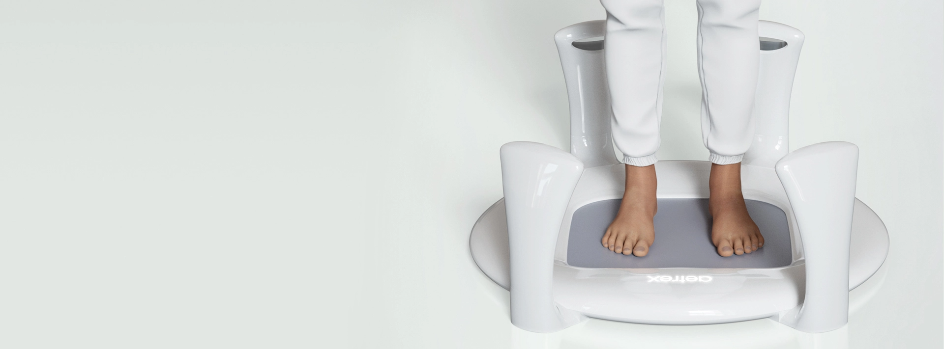 Person standing on a white scale with a gray platform against a white background