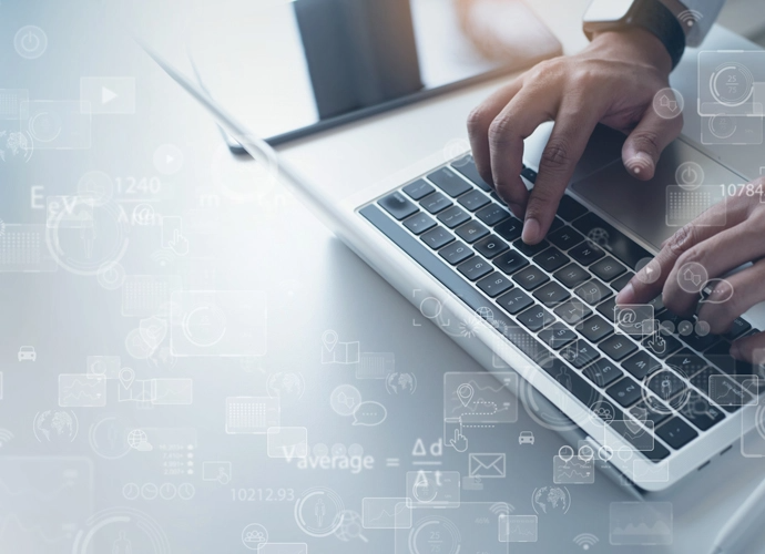 person typing on a computer