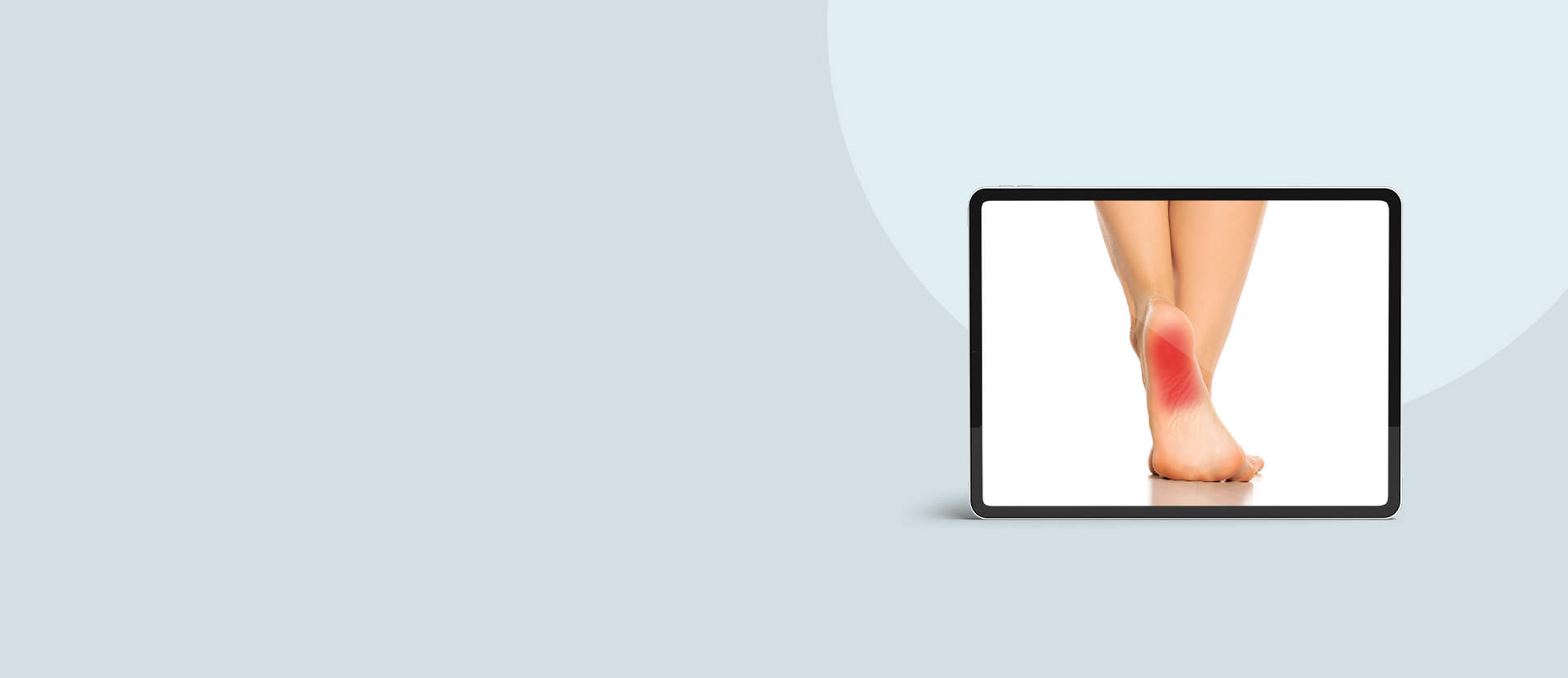 Digital display showing a close-up of a foot with redness on a light gray background