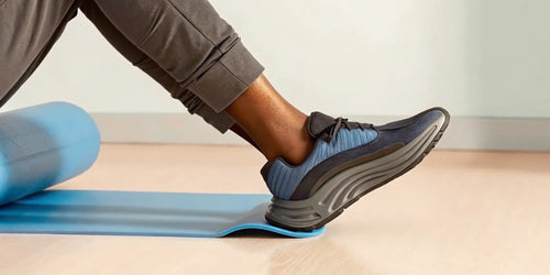 A blue men's running shoe, one of the best for high arches in 2019, with superior cushioning and support.