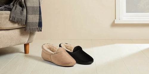 The best insoles for flat feet and overpronation inside a pair of cozy slippers.