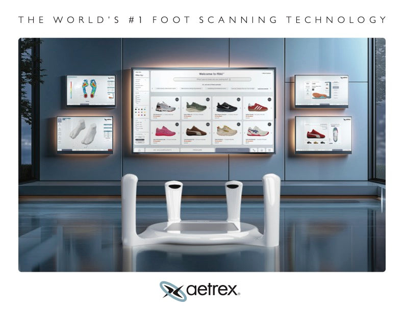 Aetrex foot scanning technology display in a modern interior, showing a white foot scanner device in the foreground and multiple screens displaying shoe analyses. Text at the top reads 'THE WORLD'S #1 FOOT SCANNING TECHNOLOGY' and the Aetrex logo appears at the bottom.