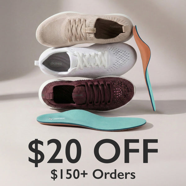 White sneakers worn by a person on a light green background with promotional text.