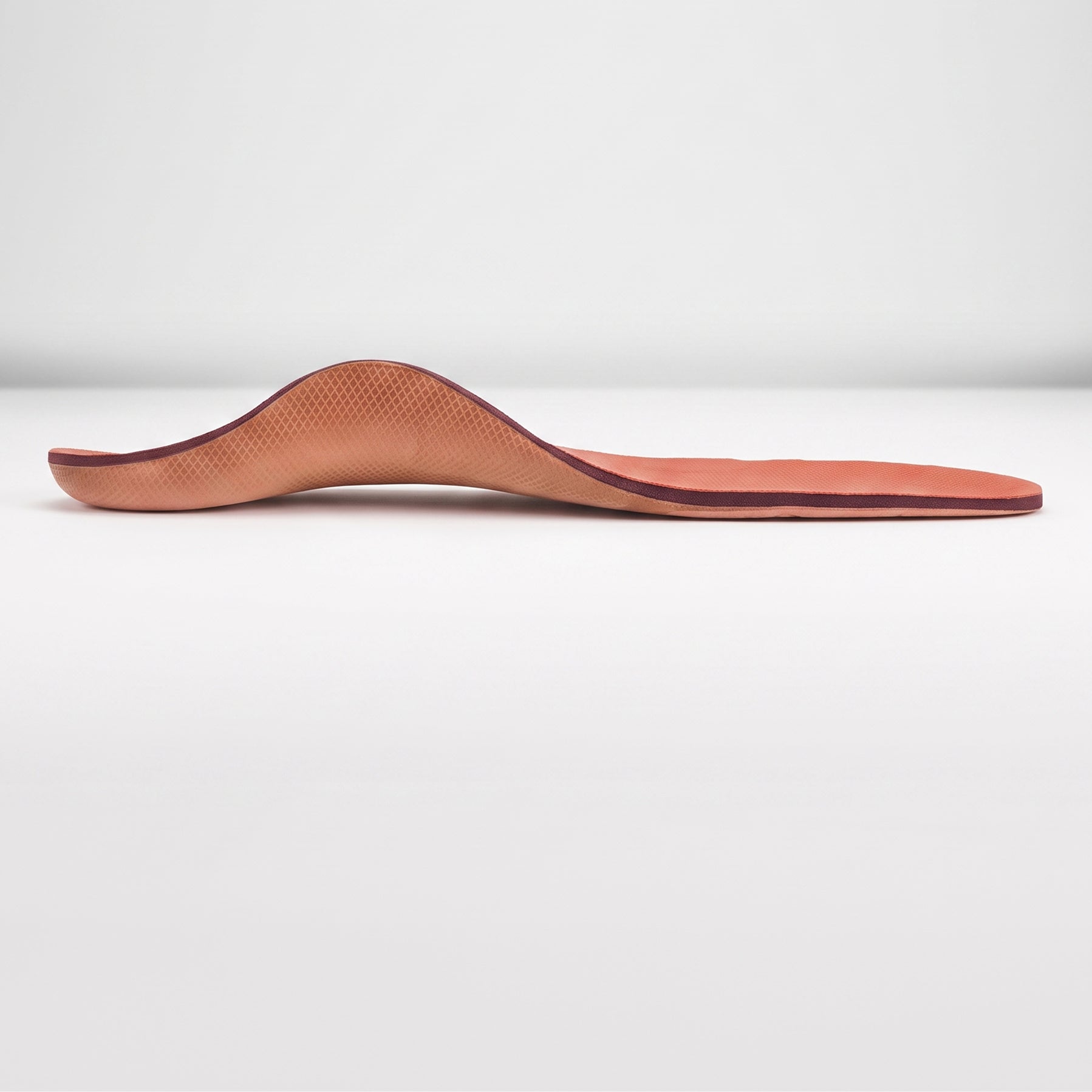 orthotic facing the right to show arch support in arch 
