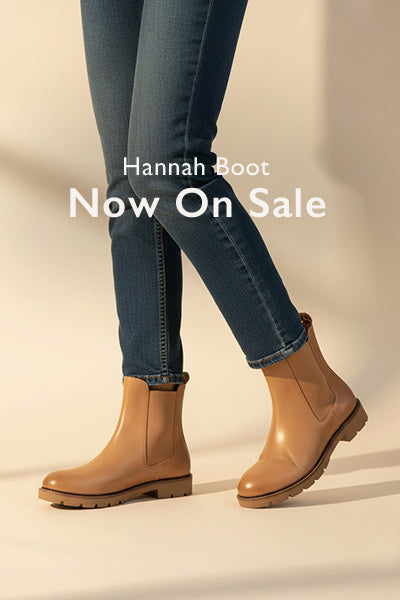 Tan boots worn with blue jeans on a beige background, featuring text 'Hannah Boot Now On Sale'.