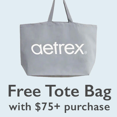 Gray tote bag with 'aetrex' logo on a light blue background