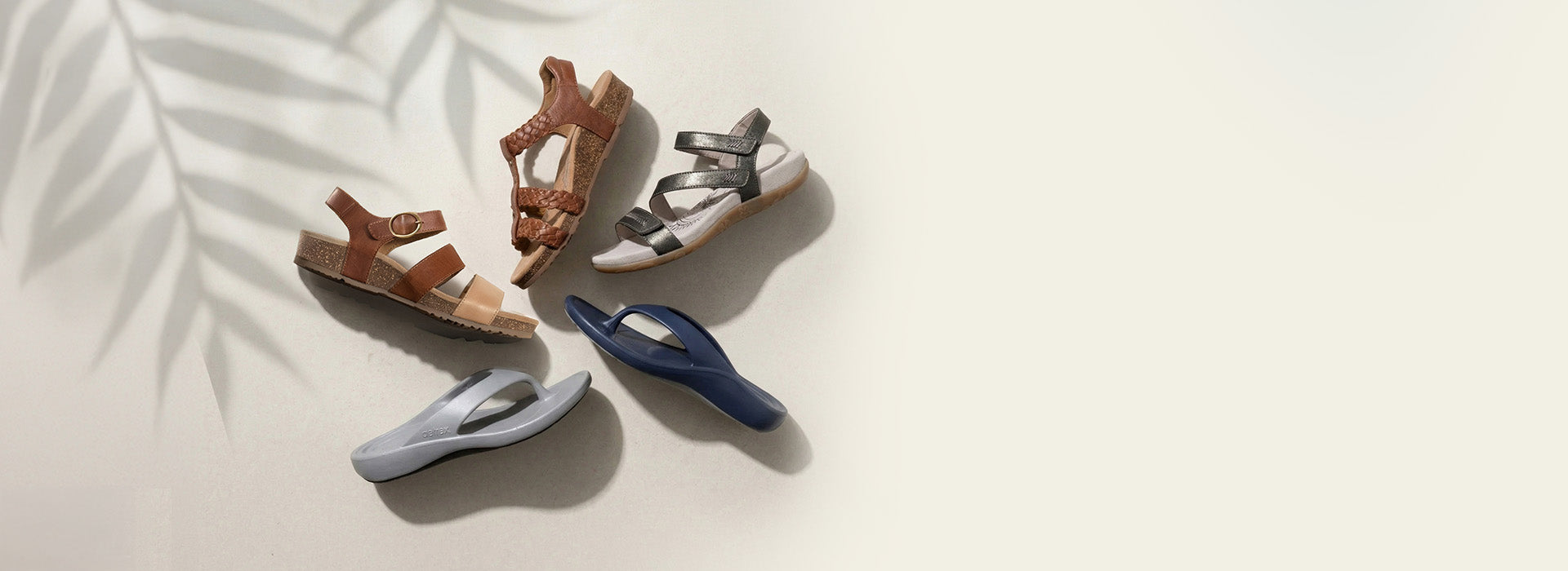 Set of sandals in various colors on a light background